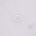 Detailed view of the button on the Slumber Cloud Performance Duvet Cover with temperature regulation technology and Tencel.